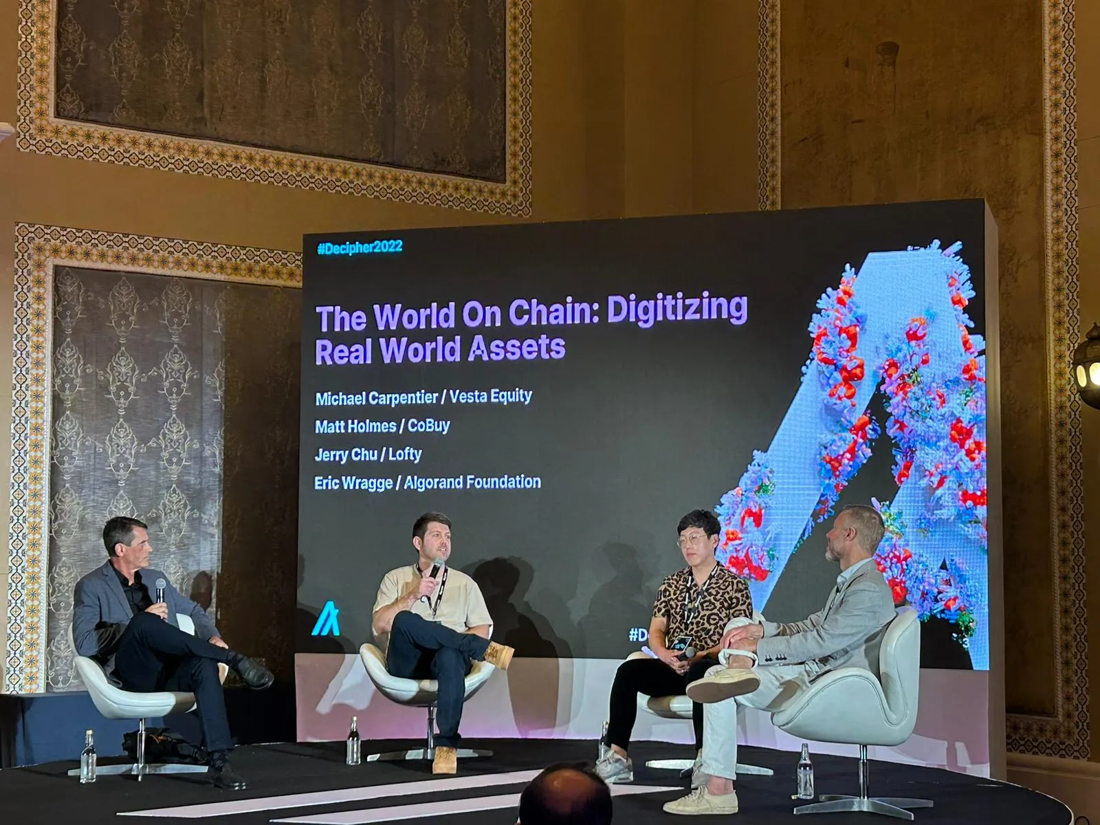 Matt Holmes on a panel at Decipher, Algorand's global conference in Dubai, on digitizing real-world assets
